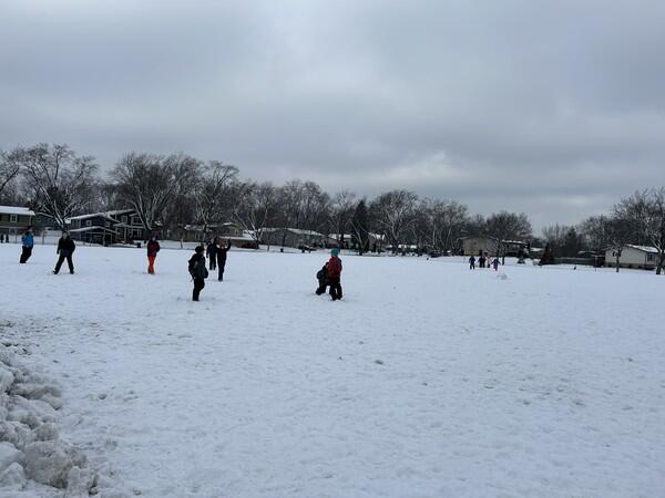 Students made the best of the snow with a game of snow football! 